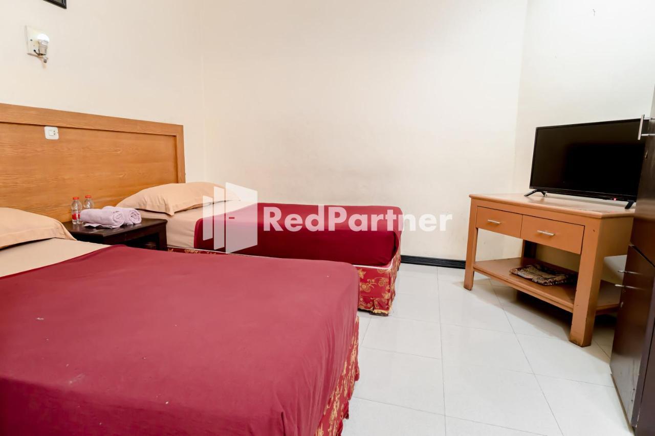 Cherry Pink Hotel Medan Mitra Reddoorz 外观 照片